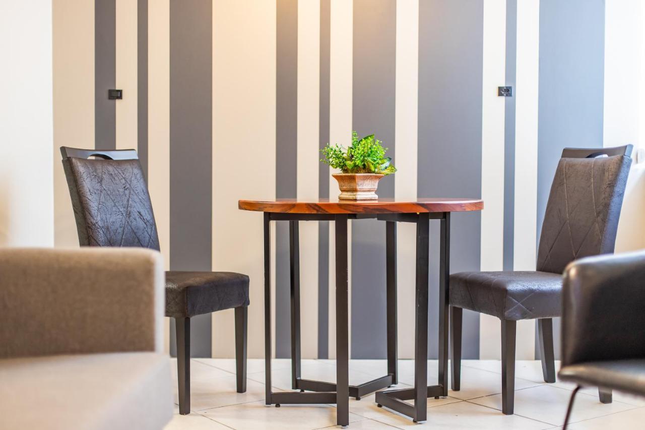 Delupo Hotel - Livin Studios Крикиума Екстериор снимка