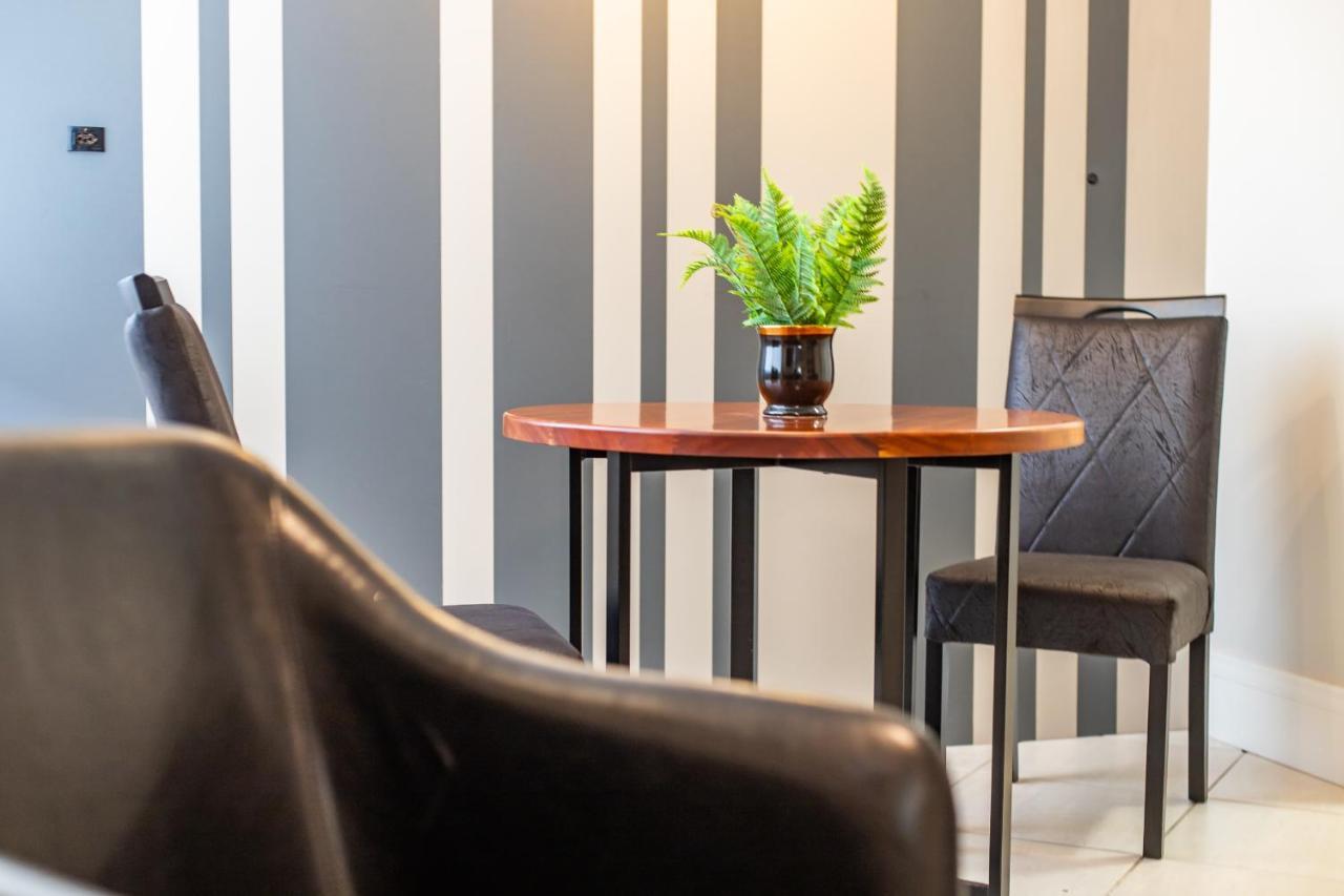 Delupo Hotel - Livin Studios Крикиума Екстериор снимка